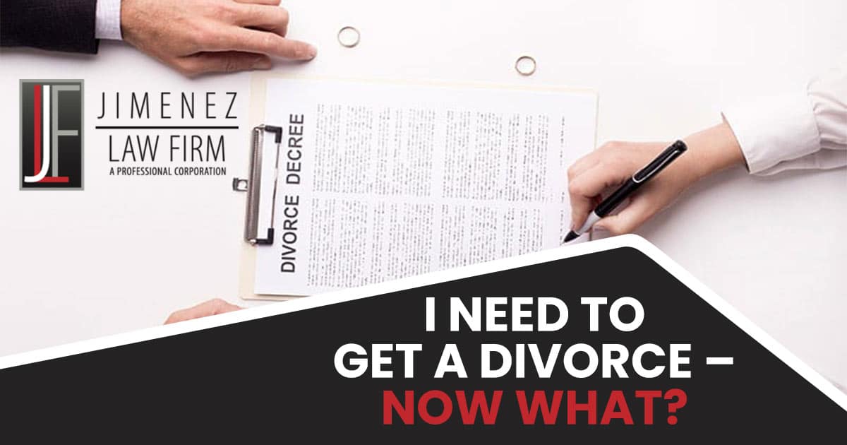 Hands of wife signing decree of divorce